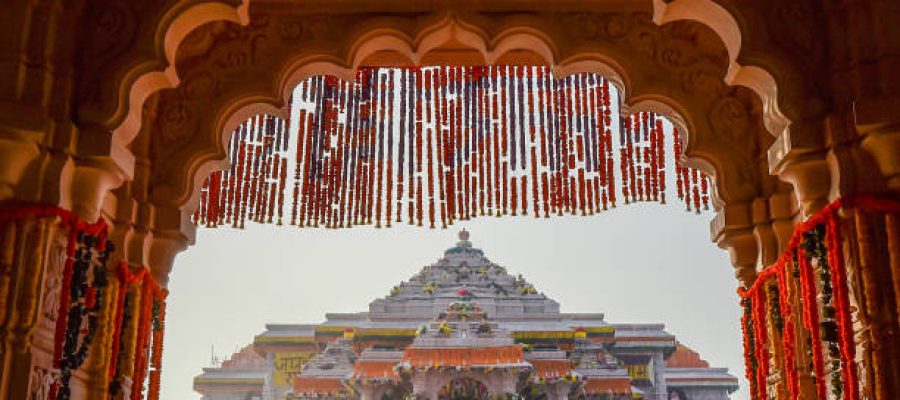 AYODHYA, INDIA - JANUARY 23: Devotees queue to get glimpse of a statue of the hindu god Ram one day after consecration ceremony of the Ram Mandir on January 23, 2024 in Ayodhya, India. The Ram Mandir, a temple built at a site thought to be the birth place of Lord Rama, a significant figure in Hindu religion, was inaugurated on Jan. 22, 2024. (Photo by Ritesh Shukla/Getty Images)